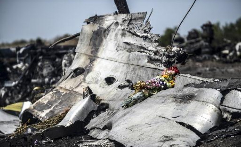 Grabove (Ukraine) (AFP). Ukraine: les débris du vol MH17 enfin en cours d'évacuation
