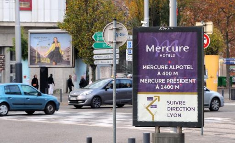 Grenoble (AFP). A Grenoble, deux visions de la ville du futur s'opposent autour des panneaux publicitaires