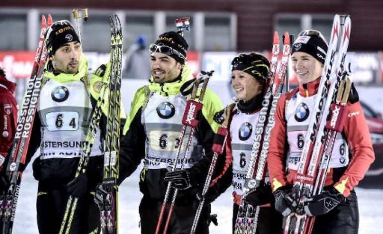 Berlin (AFP). Biathlon: Fourcade mène la France au succès en relais mixte à Oestersund