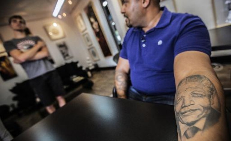 Johannesburg (AFP). Afrique du Sud: Mandela au panthéon des tatouages les plus demandés