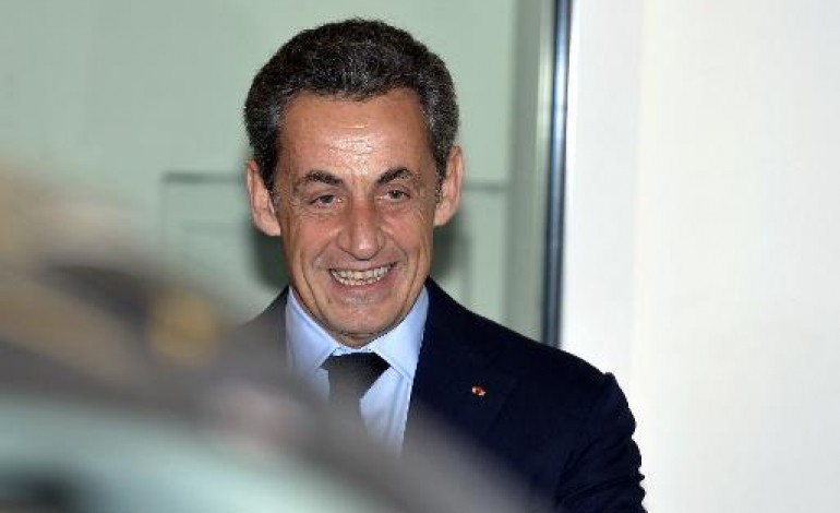 Paris (AFP). Sarkozy a fait un chèque à l'UMP pour régler les pénalités de la campagne 2012