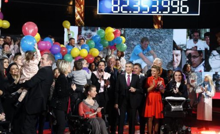 Paris (AFP). Téléthon 2014: plus de 82 millions d'euros de promesses de dons