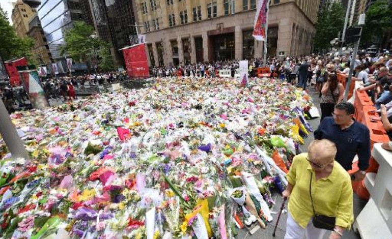 Sydney (AFP). Prise d'otages en Australie: Sydney promet la transparence et renforce la sécurité