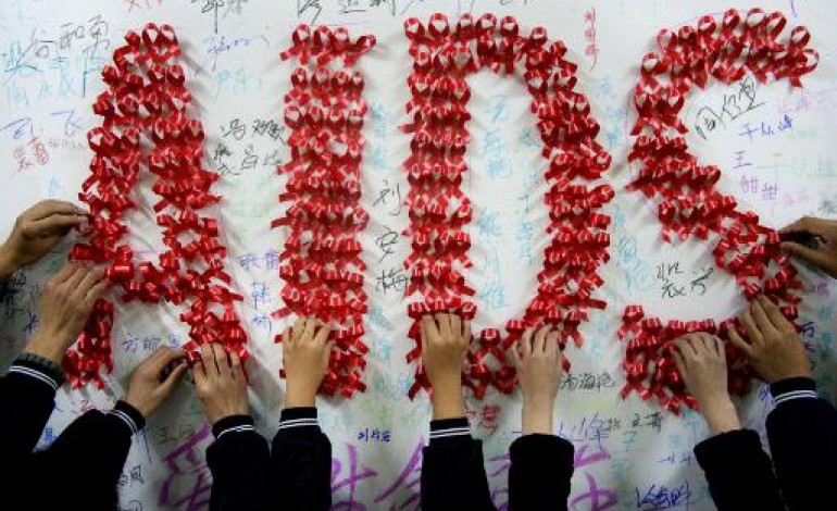 Pékin (AFP). Chine: émotion autour de Kunkun, 8 ans, séropositif, chassé de son village