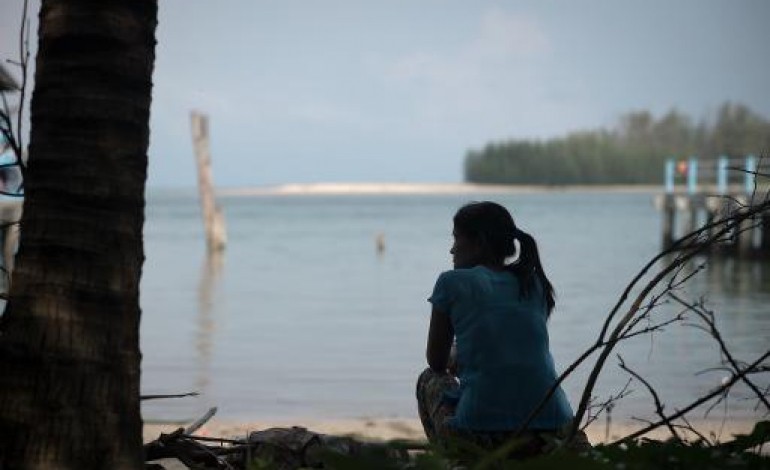 Ban Nam Khem (Thaïlande) (AFP). En Thaïlande, des immigrés hantés par leurs disparus du tsunami