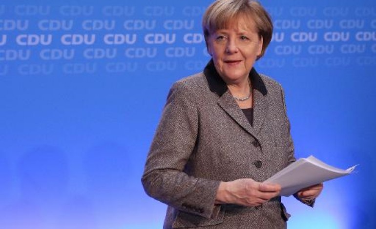 Berlin (AFP). Ukraine: Merkel s'entretient avec Poutine et Porochenko 
