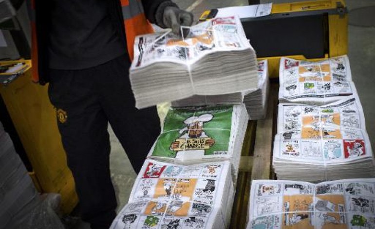 Paris (AFP). Solidaires, des journaux du monde entier publient la Une de Charlie Hebdo