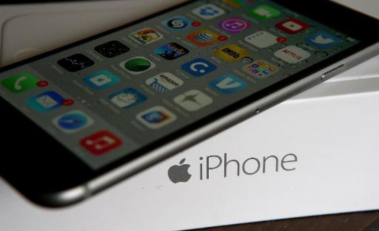 New York (AFP). Des ventes record de l'iPhone offrent à Apple un bénéfice historique