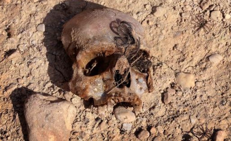 Erbil (Irak) (AFP). Les restes des corps de 23 Yazidis découverts dans un charnier en Irak