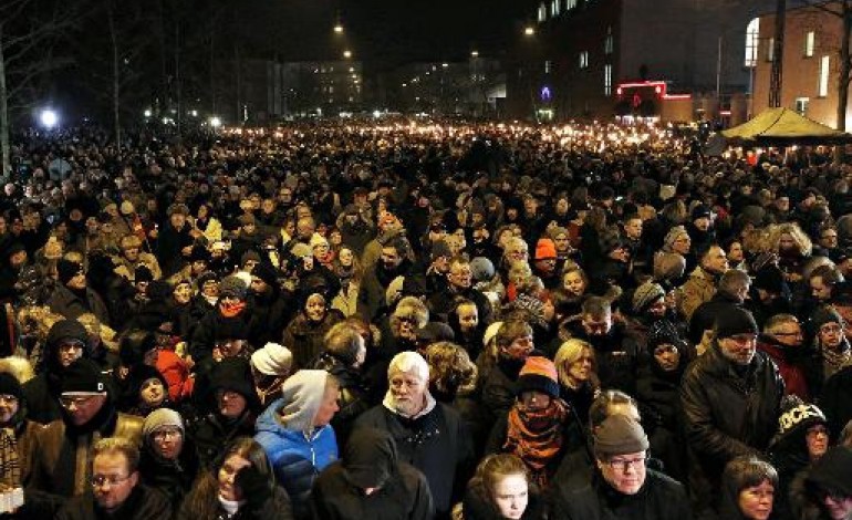 Copenhague (AFP). Attaques de Copenhague: les Danois dans la rue pour un hommage aux victimes 
