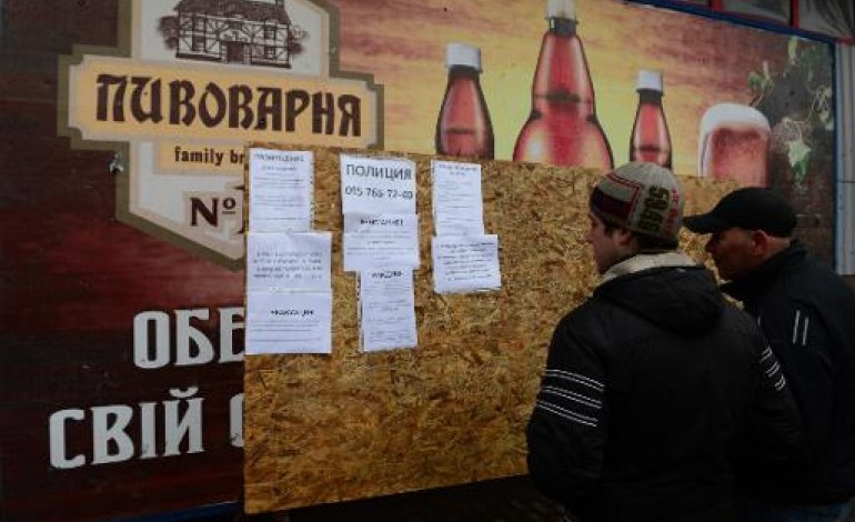 Debaltseve (Ukraine) (AFP). Ukraine: la vie reprend son cours à Debaltseve la rebelle, en attendant l'électricité