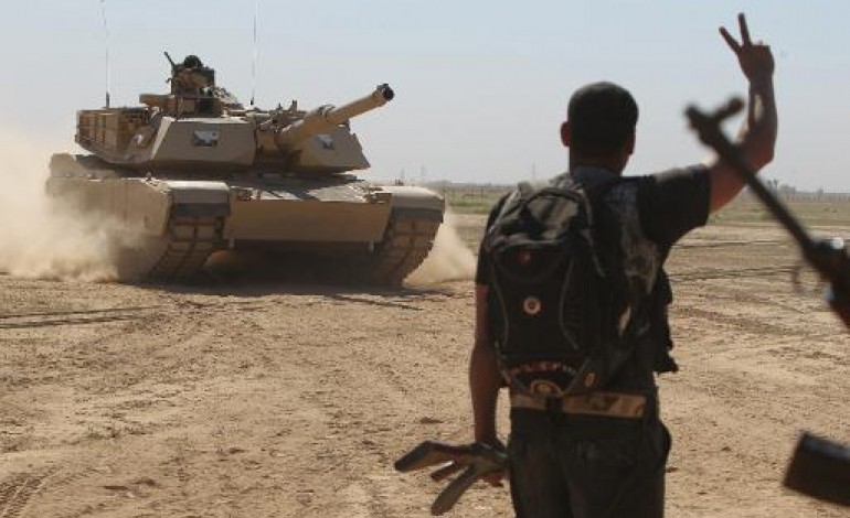 Tikrit (Irak) (AFP). L'armée irakienne entre dans Tikrit aux mains des jihadistes