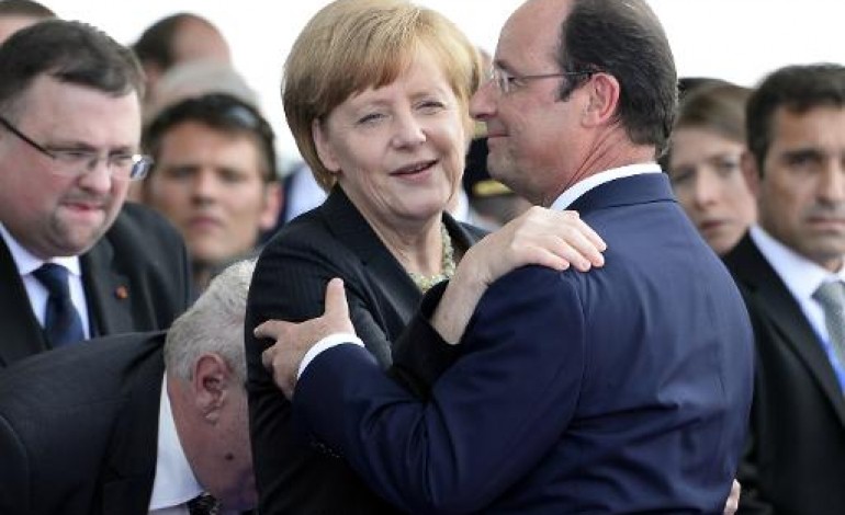 Berlin (AFP). Hollande, à Berlin, doit rassurer Merkel après sa défaite électorale