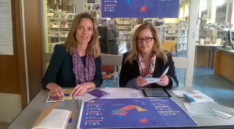 Deux bibliothécaires pour rassurer le public sur la continuité des prêts dans les sept autres bibliothèques de Caen-la-mer