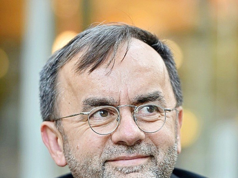 Le Père Patrick Desbois, fondateur de l'organisation Yahad-In Unum et directeur du comité épiscopal pour les relations avec le judaïsme, à Paris le 12 octobre 2016 - CHRISTOPHE ARCHAMBAULT [AFP/Archives]