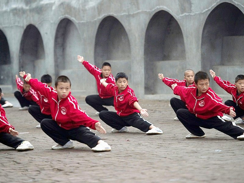Des élèves de l'école d'arts martiaux Tagou à Dengfeng en Chine, le 20 octobre 2016 - NICOLAS ASFOURI [AFP]