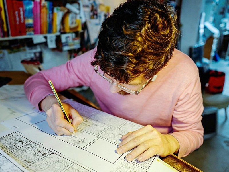 Le dessinateur allemand Mawil dans son studio à Berlin, le 23 novembre 2016 - John MACDOUGALL [AFP]