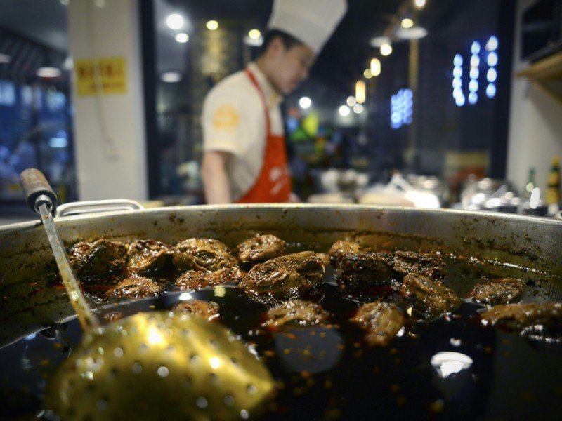 Des têtes de lapîn cuisinées le 8 septembre 2016 dans un restaurant de Chengdu en Chine - WANG ZHAO [AFP]
