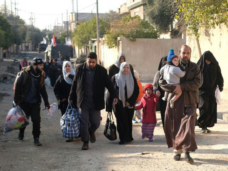 Des civils fuient les combats, le 4 janvier 2017 à Mossoul - Ahmad MOUSA [AFP]