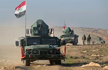 Les forces irakiennes avancent vers l'aéroport le 23 février 2017 à Mossoul - AHMAD AL-RUBAYE [AFP]
