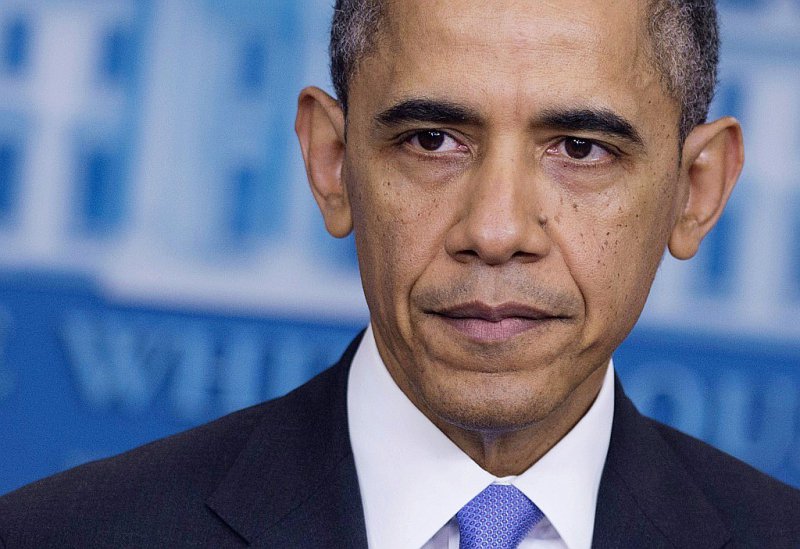 L'ex-président américain Barack Obama lors d'une conférence de presse à la Maison Blanche, le 20 décembre 2013 - SAUL LOEB [AFP/Archives]