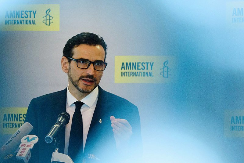 Le directeur de la région Asie de l'Est pour Amnesty International, Nicholas Bequelin, le 10 avril 2017 à Hong Kong - ANTHONY WALLACE [AFP]