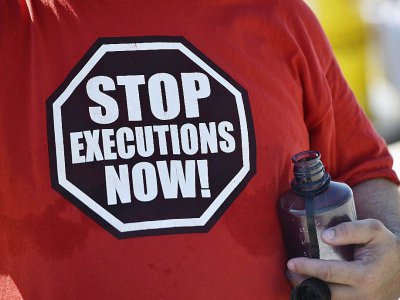 Militant anti-peine de mort, le 29 juin 2016, à Washington DC - MANDEL NGAN [AFP/Archives]