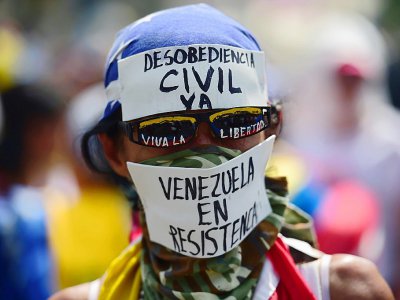 Un manifestant contre le président vénézuélien Nicolas Maduro à Caracas, le 19 avril 2017 - RONALDO SCHEMIDT [AFP]