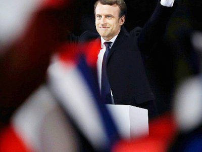 Le président élu Emmanuel Macron le soir de sa victoire le 7 mai  2017 à Paris - Patrick KOVARIK [AFP]