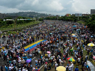 Manifestation contre le président Nicolas Maduro le 15 mai 2017 à Caracas - Federico PARRA [AFP]