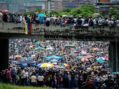 Protestation pour exiger le départ du président socialiste Nicolas Maduro le 15 mai 2017 à Caracas - FEDERICO PARRA [AFP]