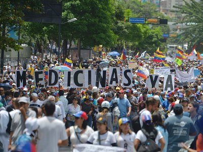 Les médecins et le personnel de santé manifestent à Caracas, au Vénézuela, le 22 mai 2017 - LUIS ROBAYO [AFP]
