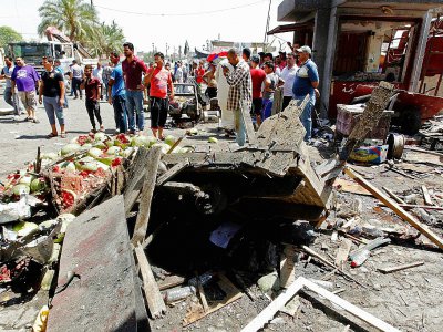 Sur le site d'un attentat à Bagdad, le 30 mai 2017 - SABAH ARAR [AFP]