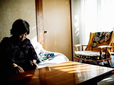 Une Japonaise atteinte de démence chez elle à Kawasaki, au Japon, le 10 janvier 2017 - BEHROUZ MEHRI [AFP]