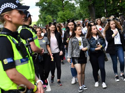 Des spectateurs arrivent 
Des spectateurs arrivent 
au concert One Love en mémoire des victimes de  l'attentat de Manchester, le 4 juin 2017 à Manchester - Anthony Devlin [AFP]