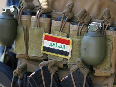 Grenades et munitions d'un membre des forces irakiennes le 19 juin 2017 - AHMAD AL-RUBAYE [AFP/Archives]