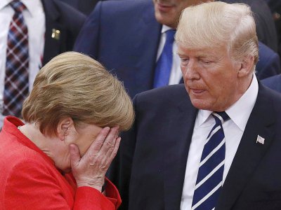 La chancelière Angela Merkel aux côtés de Donald Trump au sommet du G20 à Hambourg, en Allemagne, le 7 juillet 2017. - PHILIPPE WOJAZER [POOL/AFP]