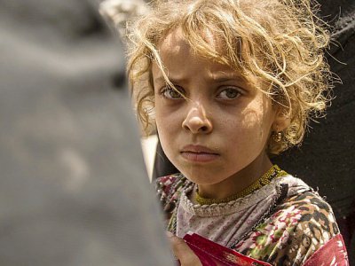 Une fillette qui fuit la bataille de Mossoul, en Irak, le 8 juillet 2017 - Fadel SENNA [AFP]