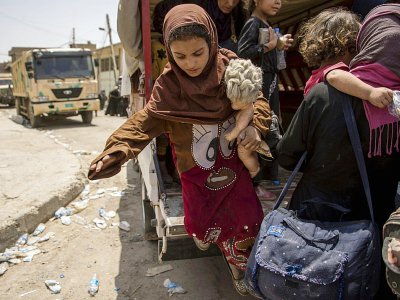 Une fillette irakienne qui fuit les combats de Mossoul, le 8 juillet 2017 - Fadel SENNA [AFP]