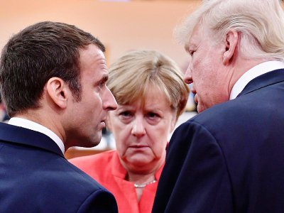 Le président américain Donald Trump, le président français Emmanuel Macron et la chancelière allemande Angela Merkel au sommet du G20 à Hambourg, au nord de l'Allemagne, le 7 juillet 2017 - John MACDOUGALL [AFP/Archives]