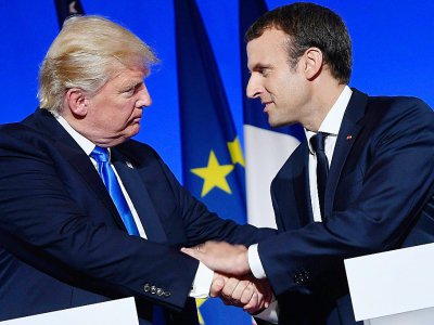 Les présidents français Emmanuel Macron et américain Donald Trump, lors d'une conférence de presse au Palais de l'Elysée à Paris le 13 juillet 2017 - SAUL LOEB [AFP/Archives]