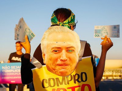 Des opposants manifestent contre le président brésilien Michel Temer, à Brasilia, le 2 août 2017 - Sergio LIMA [AFP]