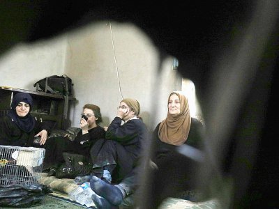 Membres d'une famille arménienne qui ont fui Raqa à Jazra, en Syrie, le 8 août 2017 - Delil souleiman [AFP]