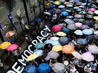 Des manifestants prodémocratie de la "révolte des parapluies" manifestent à Hong Kong, le 1er juillet 2017 - Anthony WALLACE [AFP/Archives]