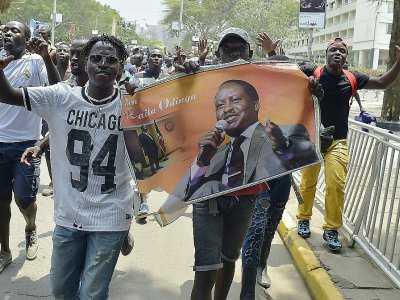 Des partisans du chef de l'opposition kényane Raila Odinga manifestent leur joie à Nairobi après la décision de la Cour suprême d'annuler la présidentielle du 8 août, le 1er septembre 2017. La Cour suprême a ordonné l'organisation d'un nouveau scruti - SIMON MAINA, SIMON MAINA [AFP]
