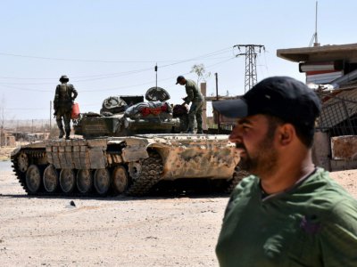 Des forces pro-gouvernementales syriennes près de Deir Ezzor, en Syrie, le 9 septembre 2017 - George OURFALIAN [AFP]