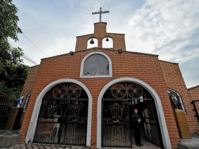 Une église dans le quartier Pablo Escobar à Madellin, en Colombie, le 8 septembre 2017 - Raul Arboleda [AFP]