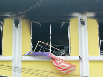 Dégâts provoqués par un incendie qui s'est déclaré dans une école religieuse, le 14 septembre 2017 à Kuala Lumpur, en Malaisie - SADIQ ASYRAF [AFP]