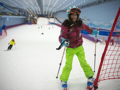 Dans le plus grand parc de ski en salle au monde à Harbin, en Chine, le 22 août 2017 - Nicolas ASFOURI [AFP]