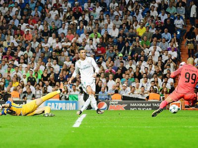 Cristiano Ronaldo, buteur contre l' APOEL Nicosie en Ligue des champions, le 13 septembre 2017 à Bernabeu, va rejouer avec le Real en Liga - PIERRE-PHILIPPE MARCOU [AFP/Archives]